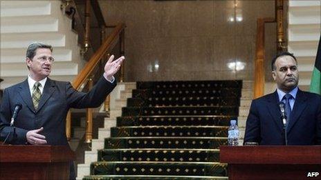 German Foreign Minister Guido Westerwelle (left) speaking alongside Libyan rebel foreign minister Ali Issawi in Benghazi, 13 June