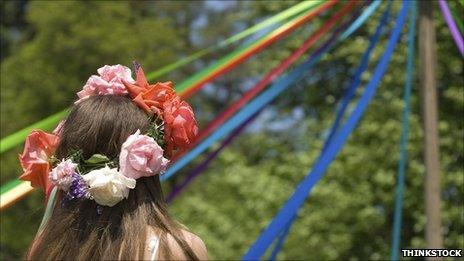 Maypole and dancer