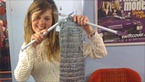 Woman knitting on train. Photo: James Bilderbeck