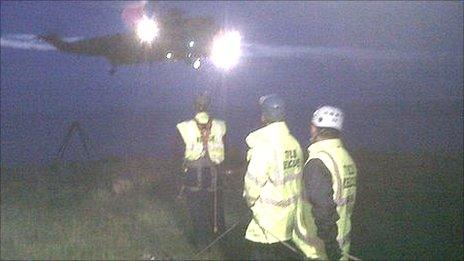 Tynemouth Volunteer Life Brigade members and rescue helicopter (pic courtesy of Tynemouth Volunteer Life Brigade)