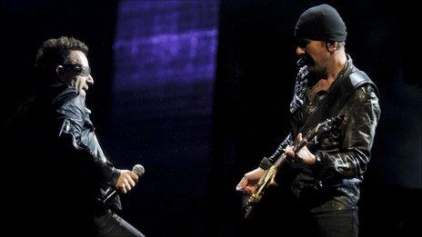 Bono and The Edge perform