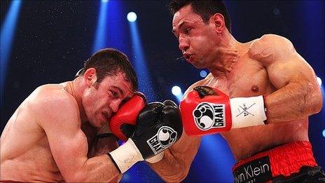 German boxer Felix Sturm (right) hits Matthew Macklin during their bout