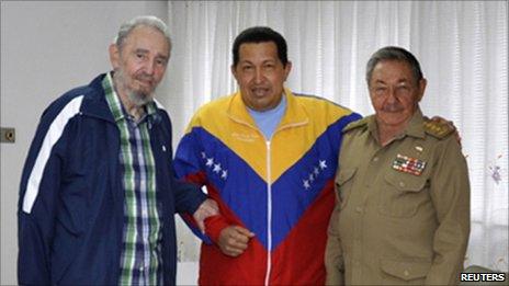 Handout photo of Venezuelan President Hugo Chavez (C) being visited by Cuban President Raul Castro (R) and its revolutionary leader Fidel Castro at a hospital in Havana on 17 June