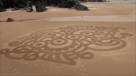 Sand sculpture of a polar bear