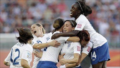 Fara Williams, third right, celebrates