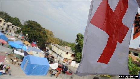 A Red Cross flag flies in Haiti