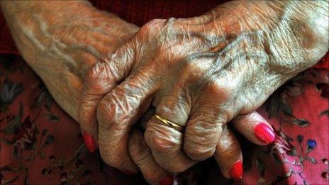 Hands of elderly woman