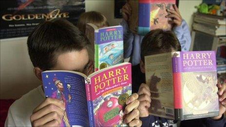 Children reading Harry Potter books