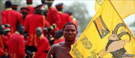 A dancer prepares for the independence day ceremony, scheduled for 9 July 2011, in Juba