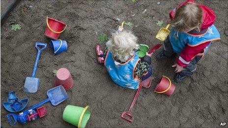 Children play outside at Egalia pre-school in Stockholm