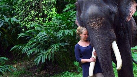 Laura Puukko with an elephant in Kerala