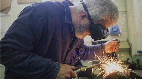 man welding