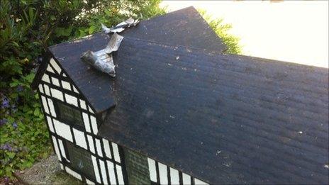 Damaged roof of Tudor style manor house