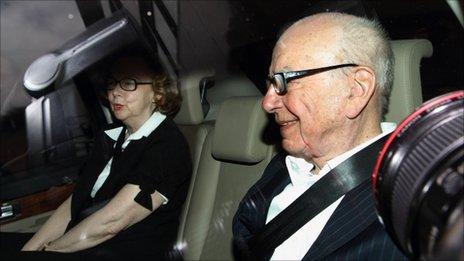 News Corporation CEO Rupert Murdoch is driven away from his flat in central London