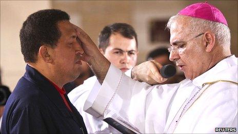 Venezuelan President Hugo Chavez attends Mass at the military academy in Caracas July 12