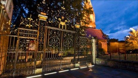 Illuminated gates at St Peter's Church, Ruthin