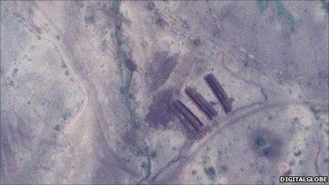 Images of Mass graves in Sudan discovered by George Clooney's Satellite Monitoring Project.