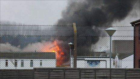 Buildings on fire at Ford open prison