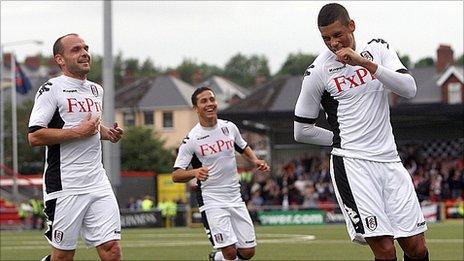 Matthew Briggs, right, celebrates his opener