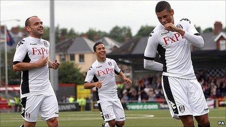 Matthew Briggs, right, celebrates his opener