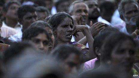 Sri Lankan Tamils gather in Kilinochchi on 14 July 2010 during a visit of President Mahinda Rajapaksa