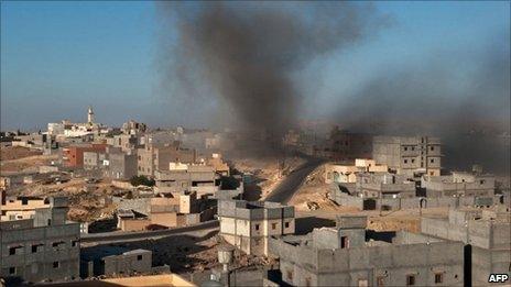 Smoke rises above the Libyan town of Nalut