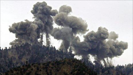 An explosion rocks al-Qaeda positions in the Tora Bora mountains after an attack by US warplanes on 14 December 2001