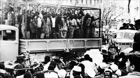 Mau Mau people in a truck in Nairobi, Kenya (1952).