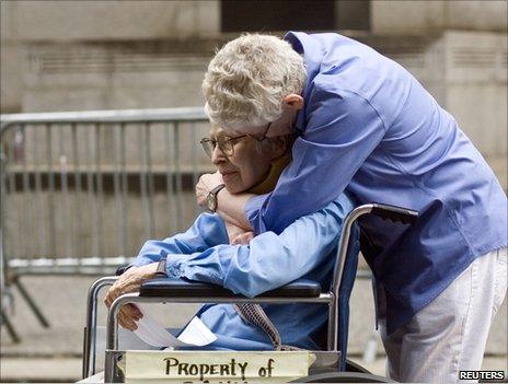 Phyllis Siegel (R) embraces her wife Connie Kopelov in Manhattan New York