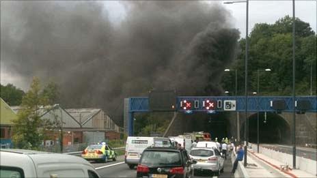 Traffic is halted as smoke billows from the Brynglas tunnels at Newport