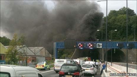 Traffic is halted as smoke billows from the Brynglas tunnels at Newport