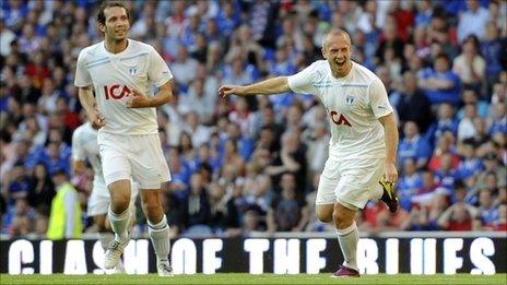 Larsson (right) celebrates his well-taken opener after 18 minutes