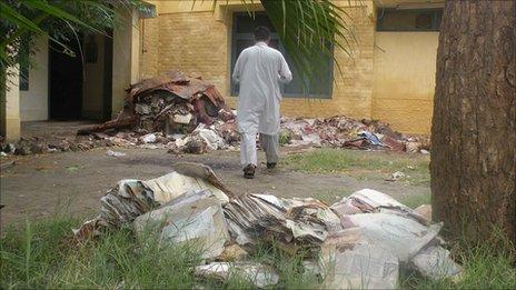 Destroyed records on the lawn of Nowshera's Tehsil office, or office of land administration