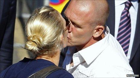 Mike Tindall and Zara Phillips leaving the Cannongate Kirk in Edinburgh