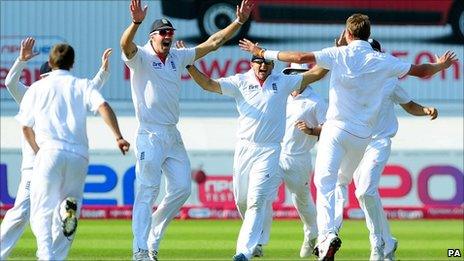 England celebrate Stuart Broad's hat-trick (Broad far right)