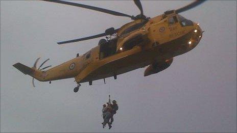 RAF helicopter crew rescue stranded walkers in Langland Bay, Swansea