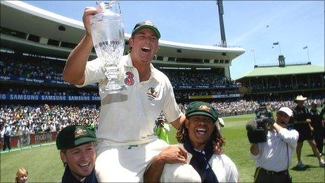 Warne, Michael Clarke and Andrew Symonds celebrate winning the Ashes in 2006