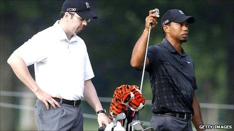 Bryon Bell with Tiger Woods