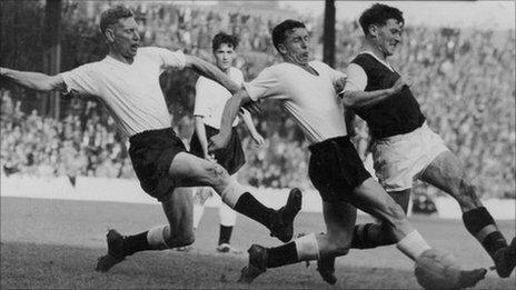 Jimmy McIlroy (far right) in action during his heyday