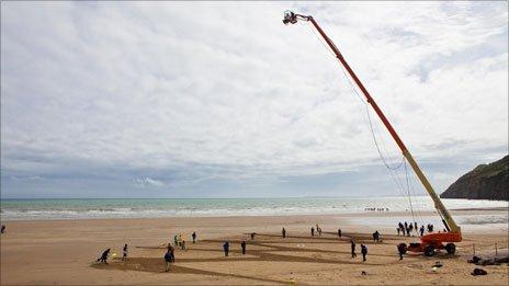 A crane on the set of Gulp at Pendine Sands, Carmarthenshire