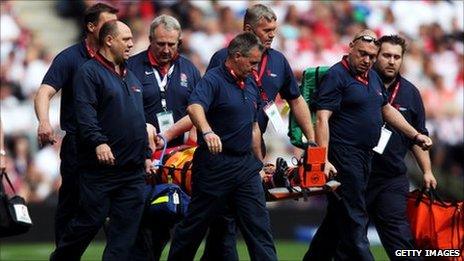 Morgan Stoddart is stretchered off at Twickenham