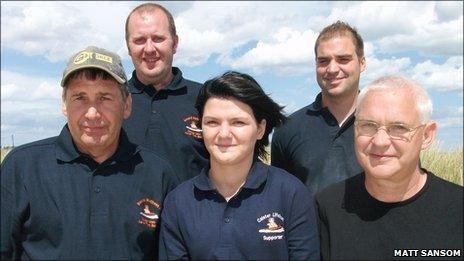 Paige Anderson (centre), Michael Anderson (right) and members of the Caister-on-Sea Lifeboat crew in Norfolk (Photo: Matt Sansom)