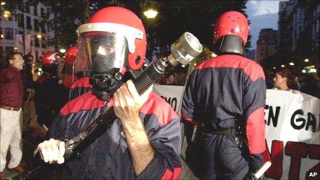 Officer with baton round in Spain