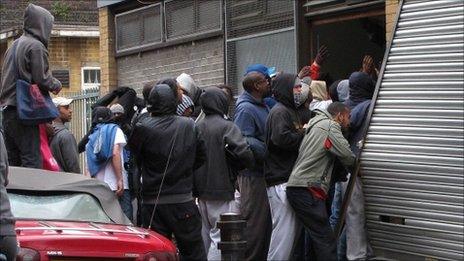 A group enter a clothes shop