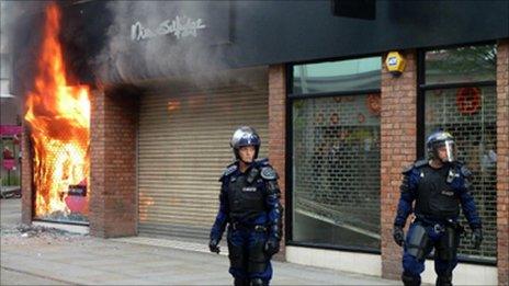 Riot police outside Miss Selfridge in Manchester