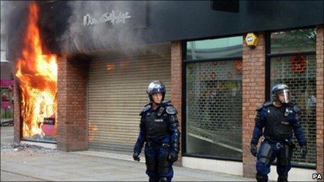 Riot police outside Miss Selfridge in Manchester