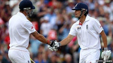 Kevin Pietersen congratulates Alastair Cook