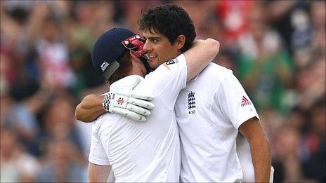 Alastair Cook (right) celebrates his double century with Eoin Morgan