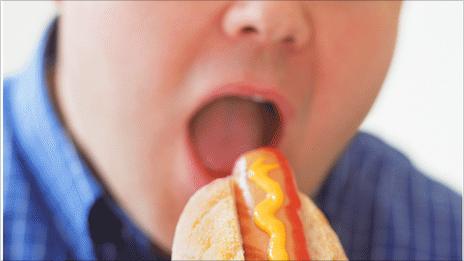 Man eating hotdog