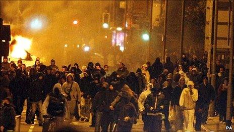 Hooded youth during riots in Liverpool